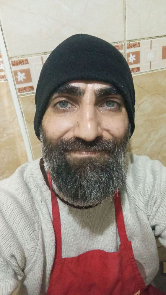 Mohammadreza travaillant dans un restaurant
